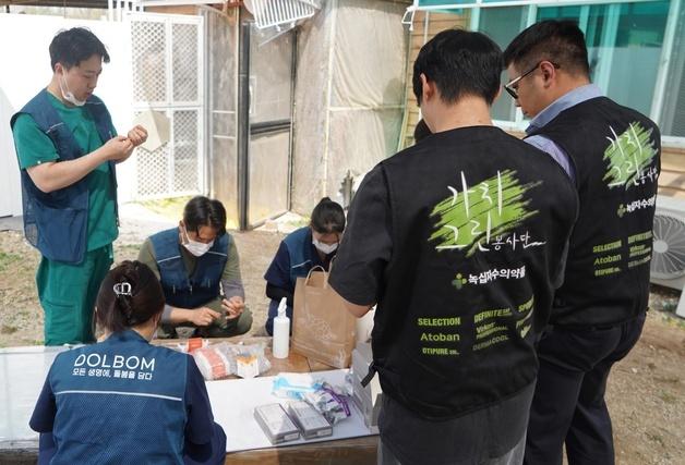 "길고양이도 정기 구충해야"…녹십자수의약품, 동물병원과 봉사